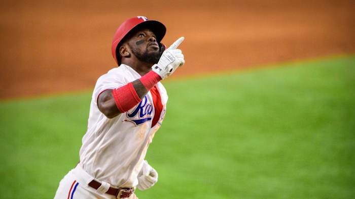 Sep 30, 2021; Arlington, Texas, USA; Texas Rangers right fielder Adolis Garcia (53) rounds third base after he hits a two run home run against the Los Angeles Angels during the fifth inning at Globe Life Field. Mandatory Credit: Jerome Miron-USA TODAY Sports